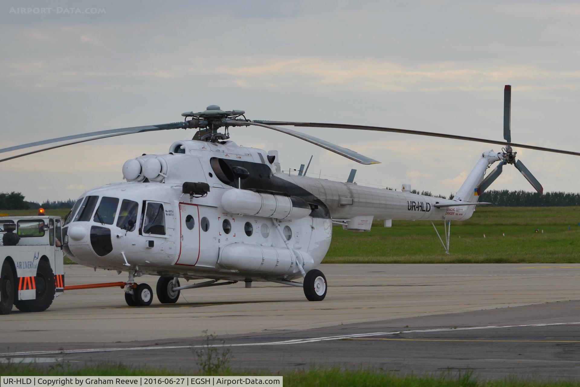 UR-HLD, Mil Mi-8MTB C/N 94915, Under tow at Norwich.