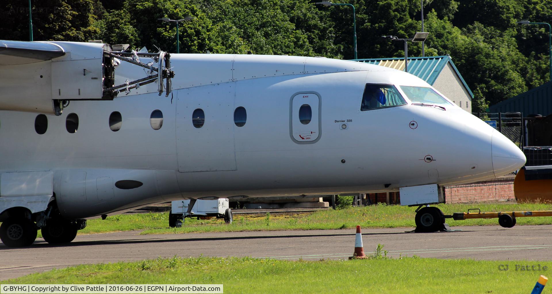 G-BYHG, 1998 Dornier 328-100 C/N 3098, Sitting engineless at the Loganair/Flybe maintenance facility at Dundee Riverside Airport EGPN