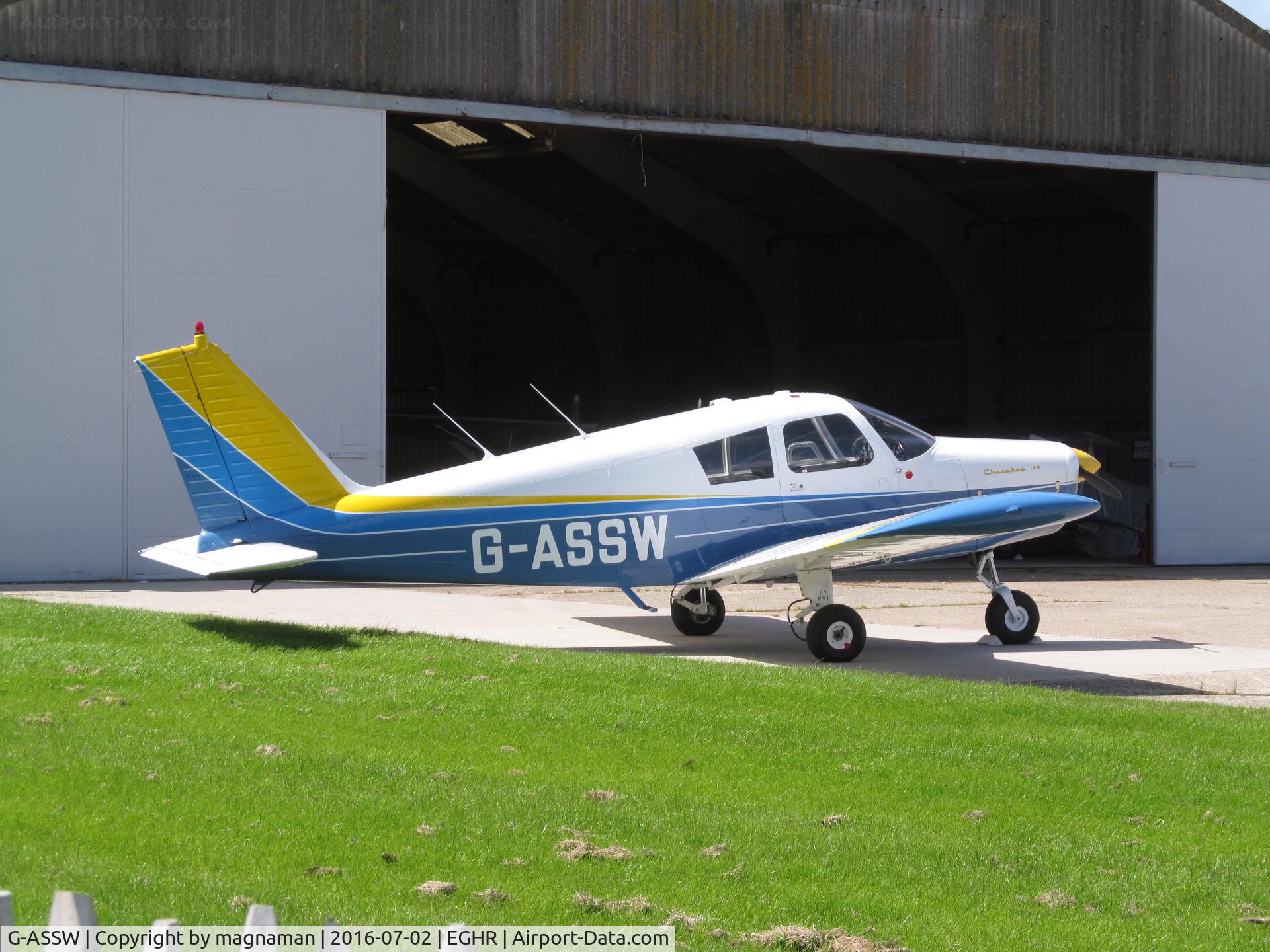 G-ASSW, 1964 Piper PA-28-140 Cherokee C/N 28-20055, outside hangar at goodwood