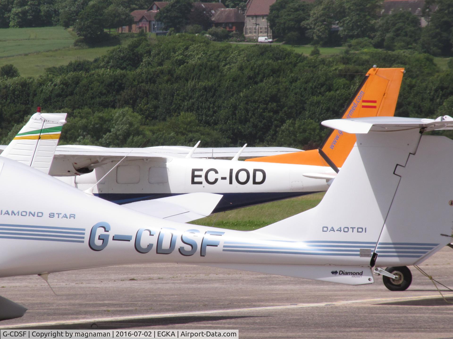 G-CDSF, 2005 Diamond DA-40D Diamond Star C/N D4.190, another diamond at EGKA. Survey a/c from spain in back ground.