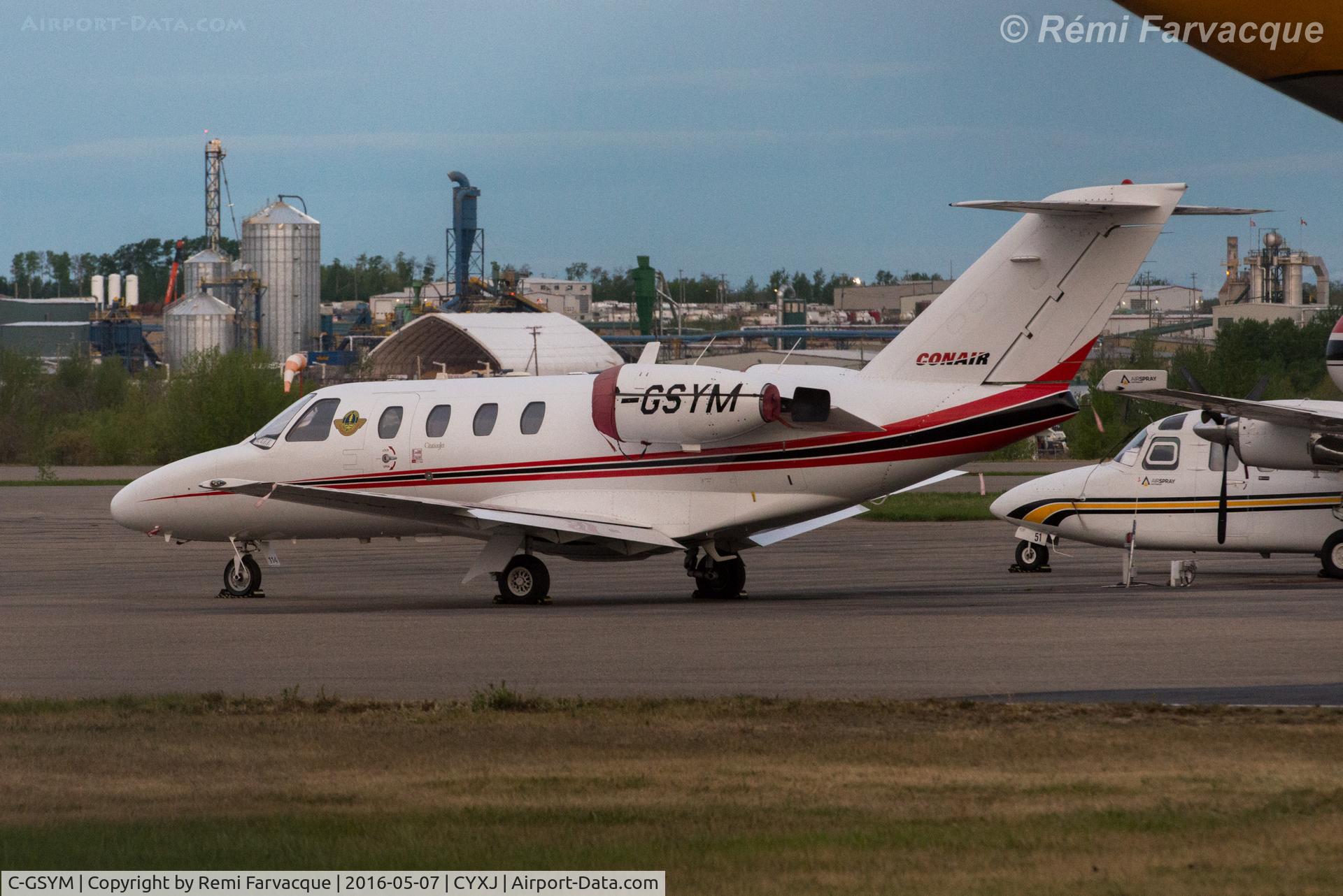 C-GSYM, 1999 Cessna 525 CitationJet CJ1 C/N 525-0302, Parked at west end of airport with other Conair aircraft. Fighting fires in the region, parked for the night.
