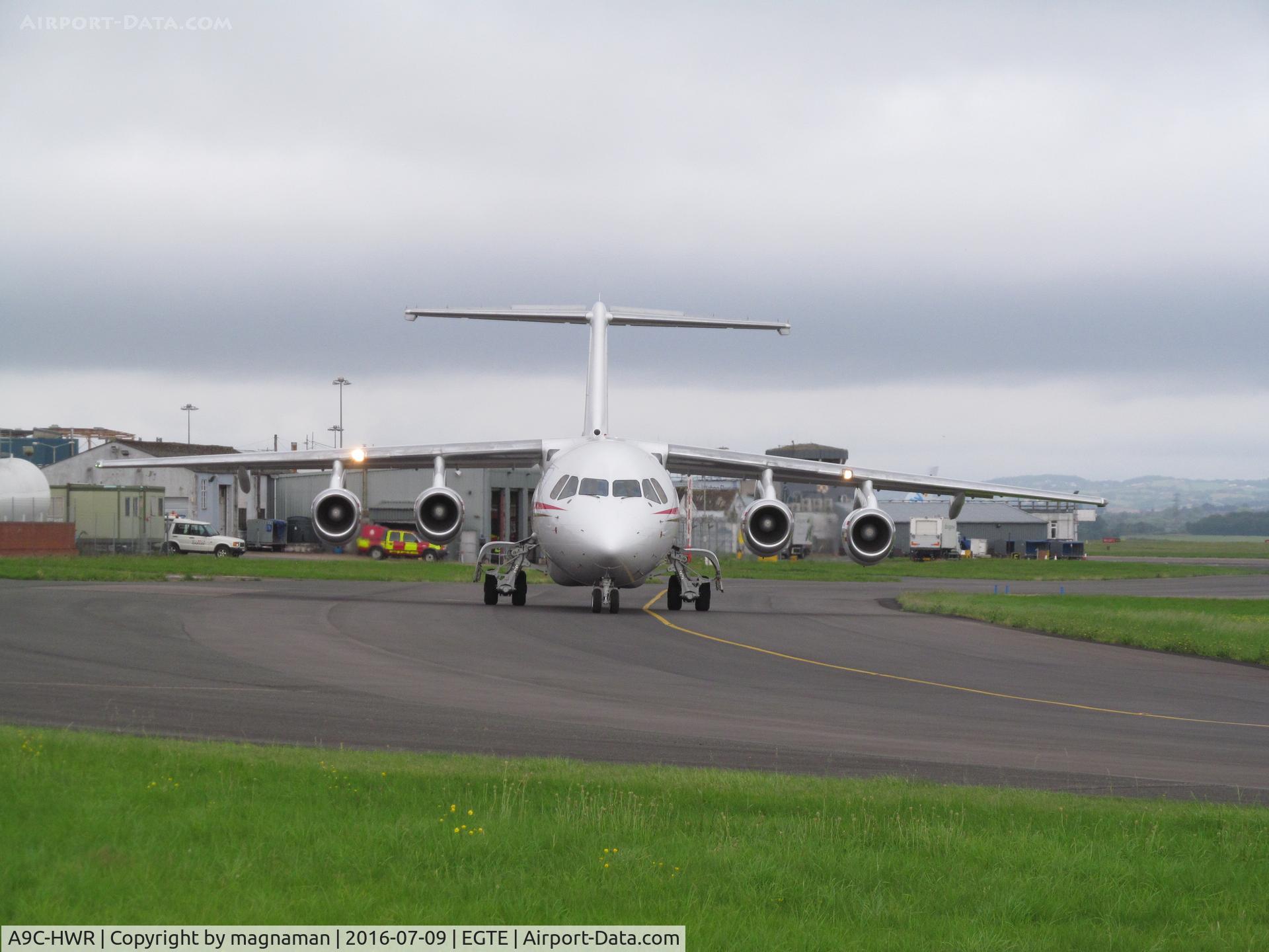 A9C-HWR, 1997 British Aerospace Avro 146-RJ85 C/N E.2306, head on with lights