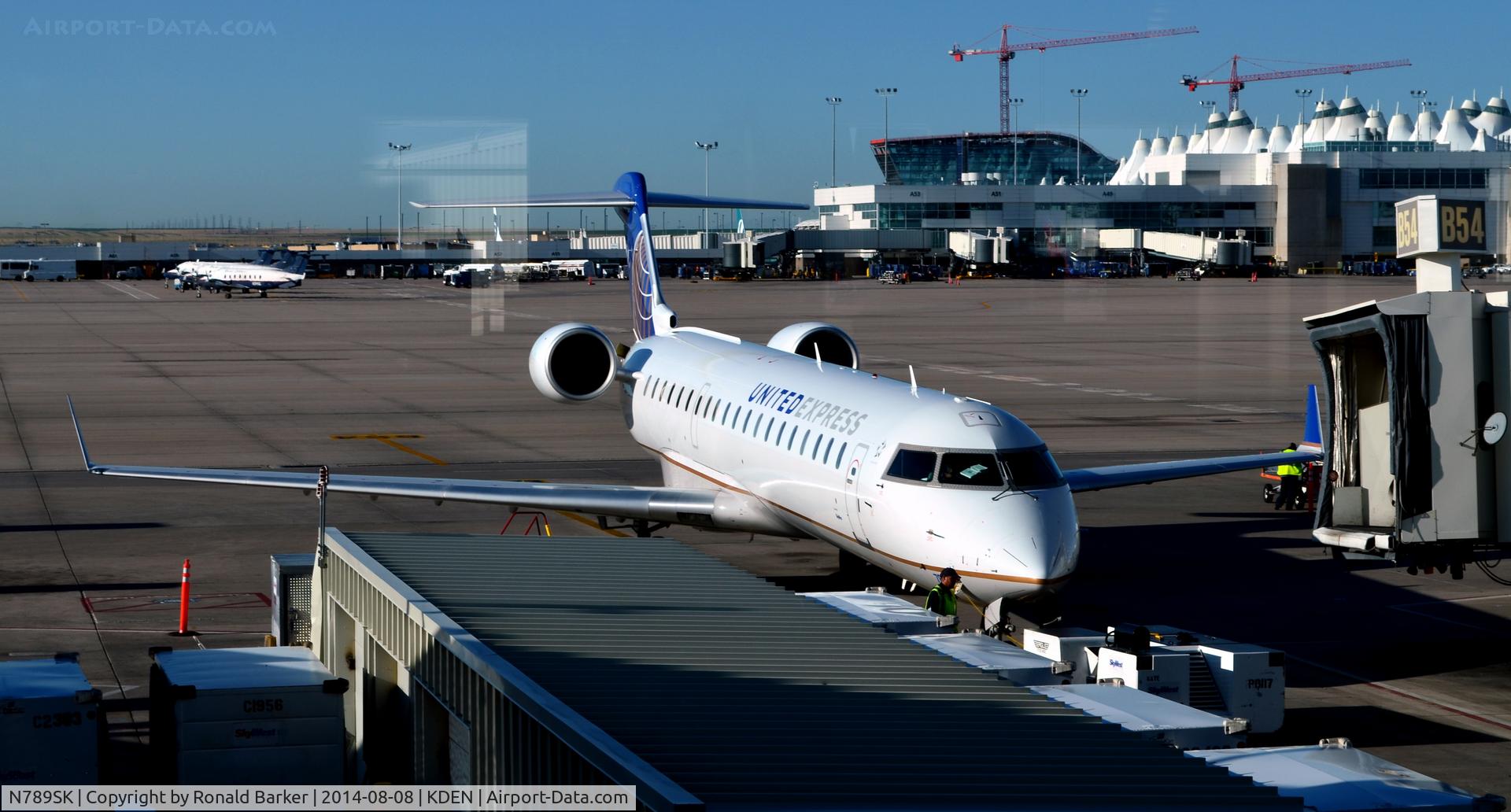 N789SK, 2009 Bombardier CRJ-700 (CL-600-2C10) Regional Jet C/N 10291, Ready for pushback Denver