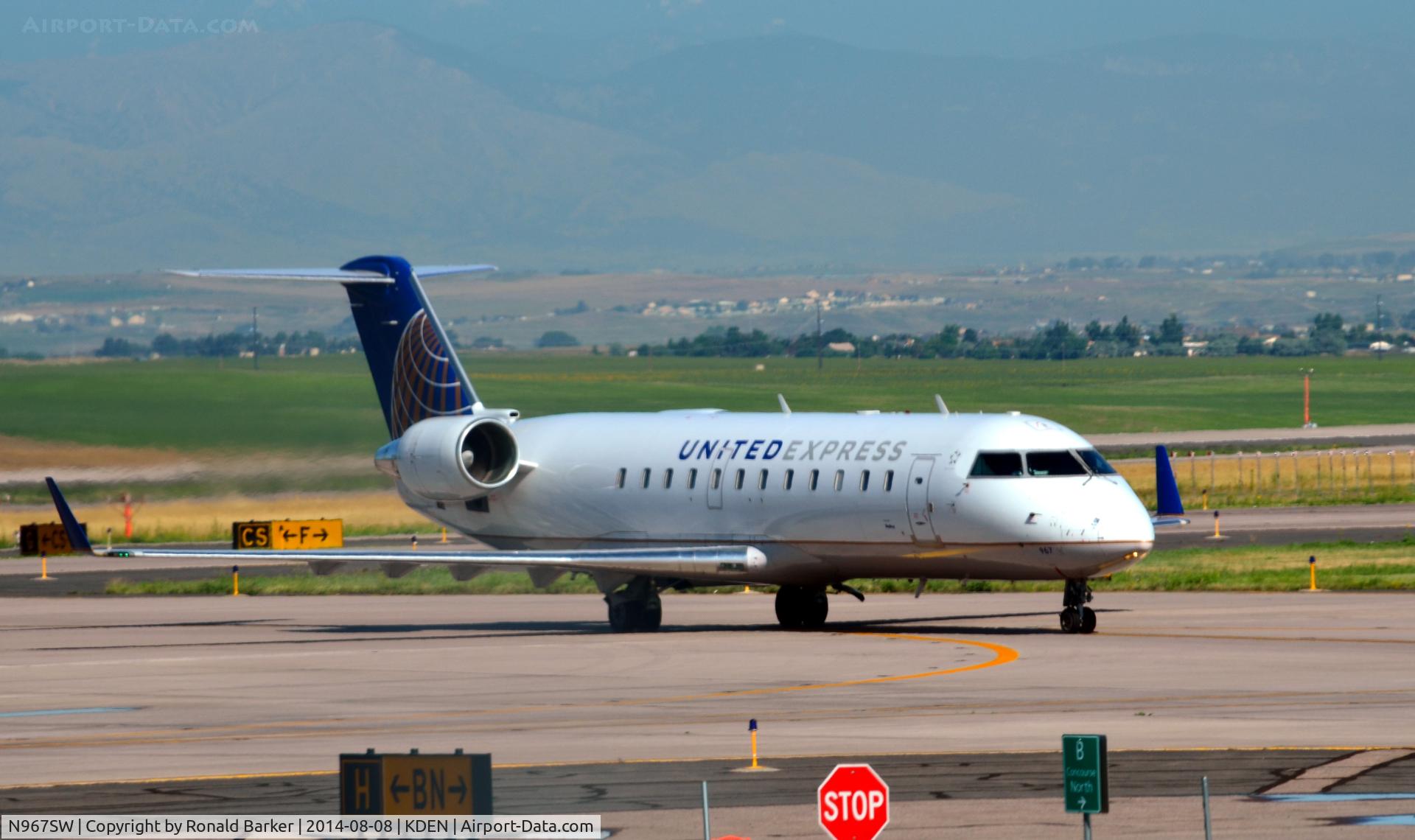N967SW, 2003 Bombardier CRJ-200ER (CL-600-2B19) C/N 7872, Taxi Denver