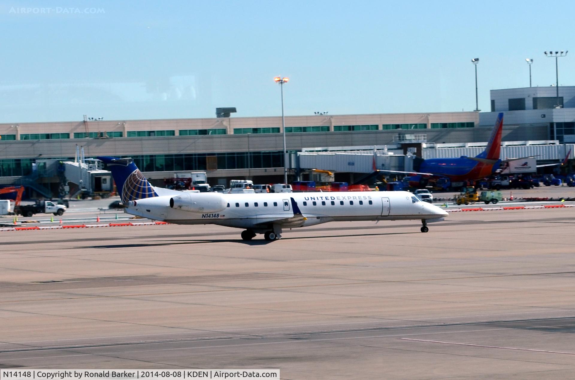 N14148, 2003 Embraer ERJ-145XR (EMB-145XR) C/N 145751, Taxi Denver