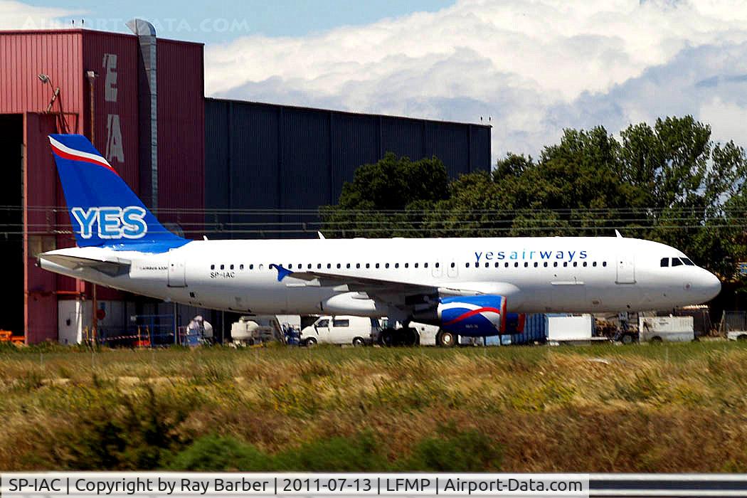 SP-IAC, 1999 Airbus A320-214 C/N 973, Airbus A320-214 [0973] (YES Airways) Perpignan-Rivesaltes~F 13/07/2011. Taken through the glass of moving coach.