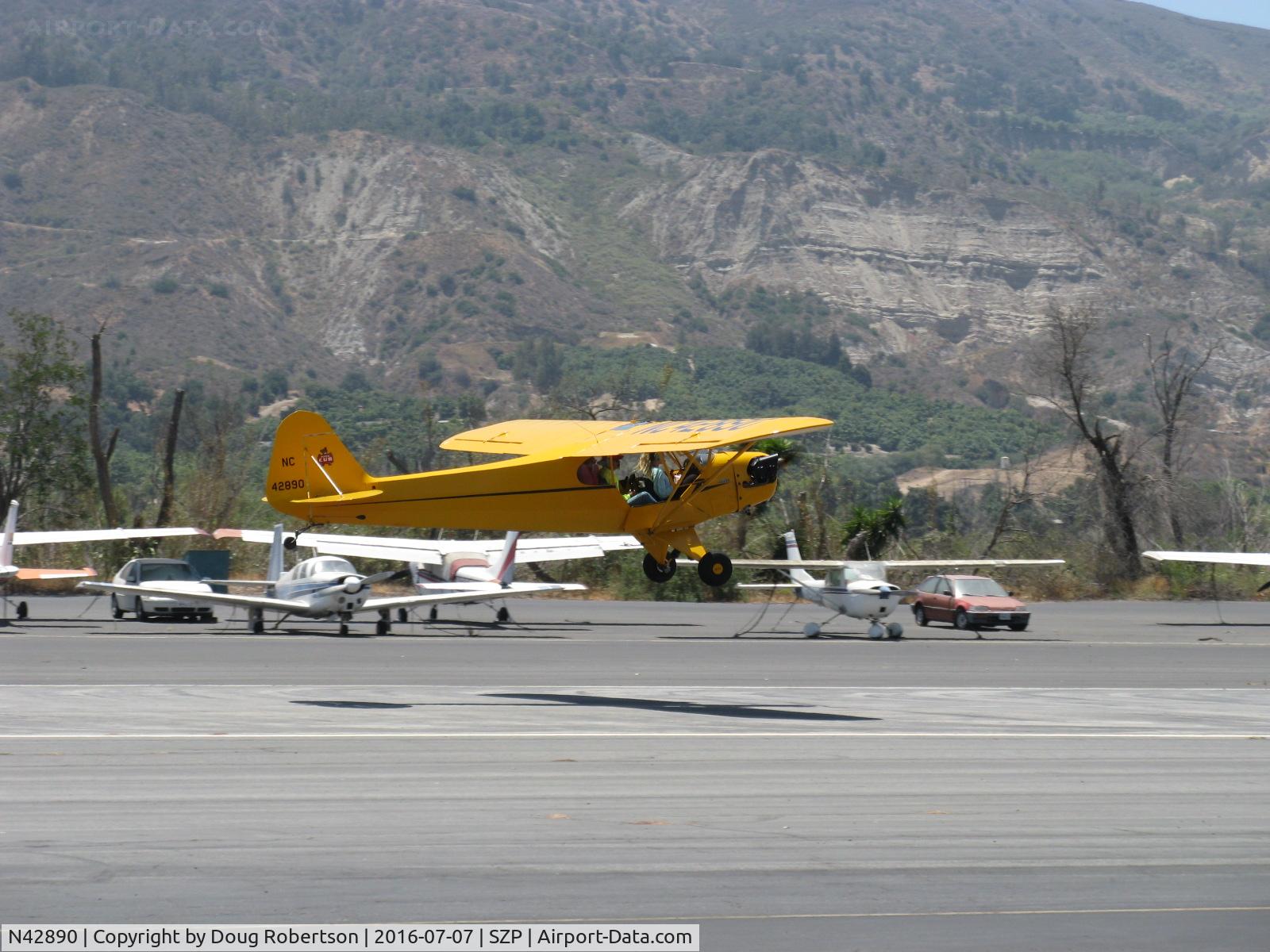 N42890, 1945 Piper J3C-65 Cub C/N 15225, 1945 Piper J3C-65 CUB, Continental A&C65 65 Hp, takeoff climb established, Rwy 22