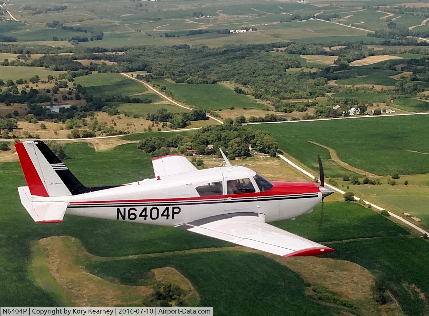 N6404P, 1959 Piper PA-24-250 Comanche C/N 24-1514, Air to air photo taken just east of KGFZ, Greenfield, IA