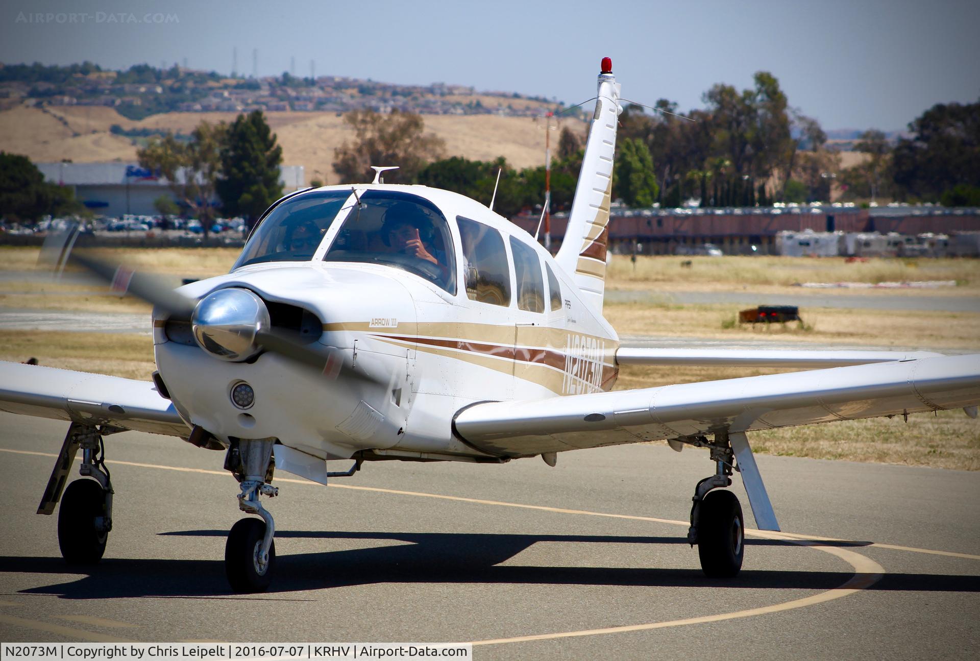 N2073M, Piper PA-28R-201 Cherokee Arrow III C/N 28R-7837065, Locally-based Piper PA-28R taxing to Nice Air at Reid Hillview Airport, San Jose, CA. Thanks for the wave!