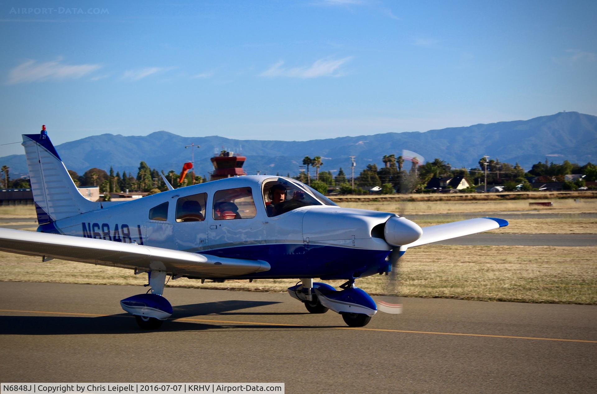 N6848J, 1976 Piper PA-28-181 Archer II C/N 28-7690409, NVY Graphics Inc (Foster City, CA) 1976 Piper PA-28-181 taxing in at Reid Hillview Airport, San Jose, CA.