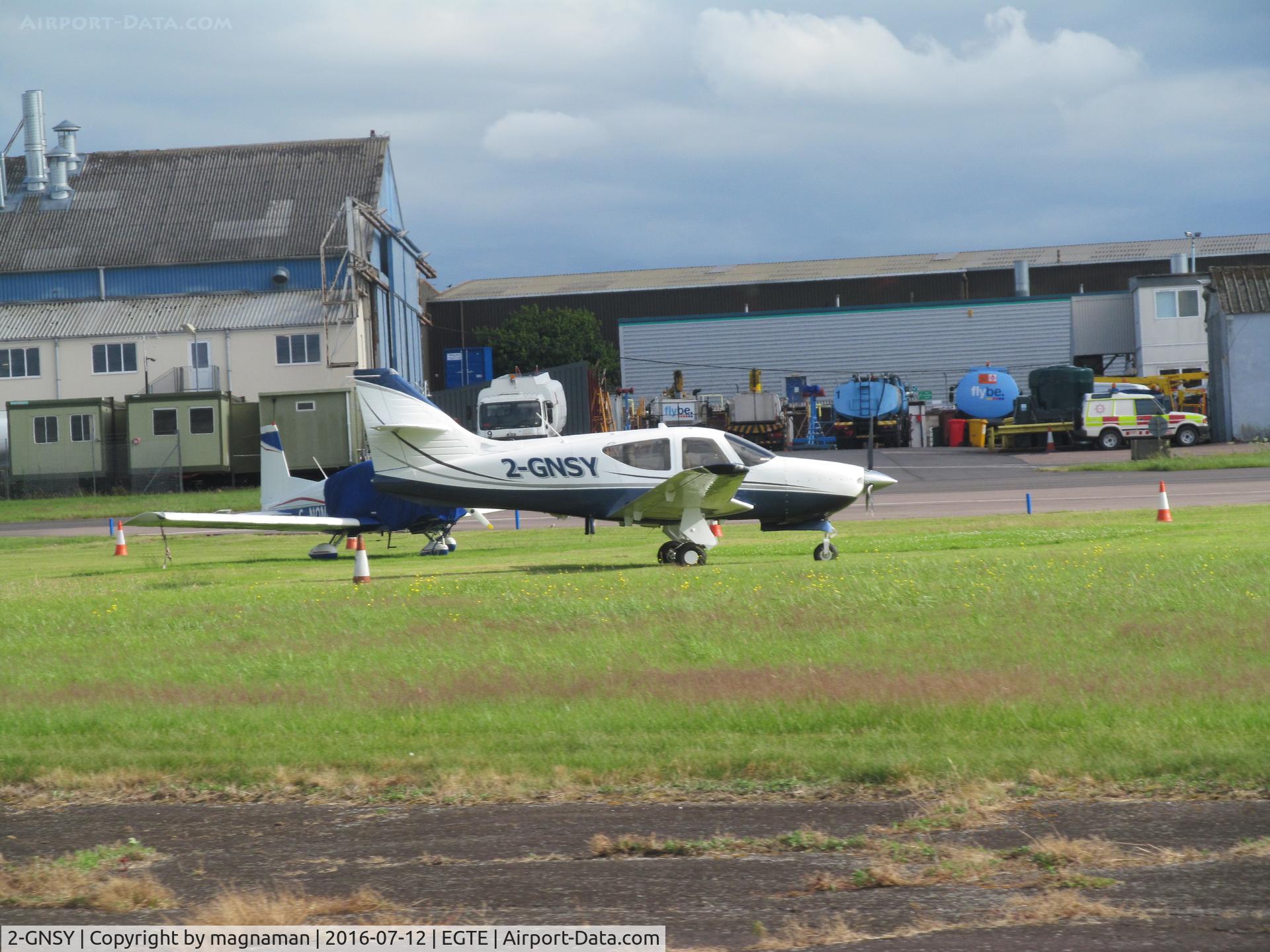 2-GNSY, 2000 Rockwell Commander 114B C/N 14679, at Exeter from our taxying aircraft