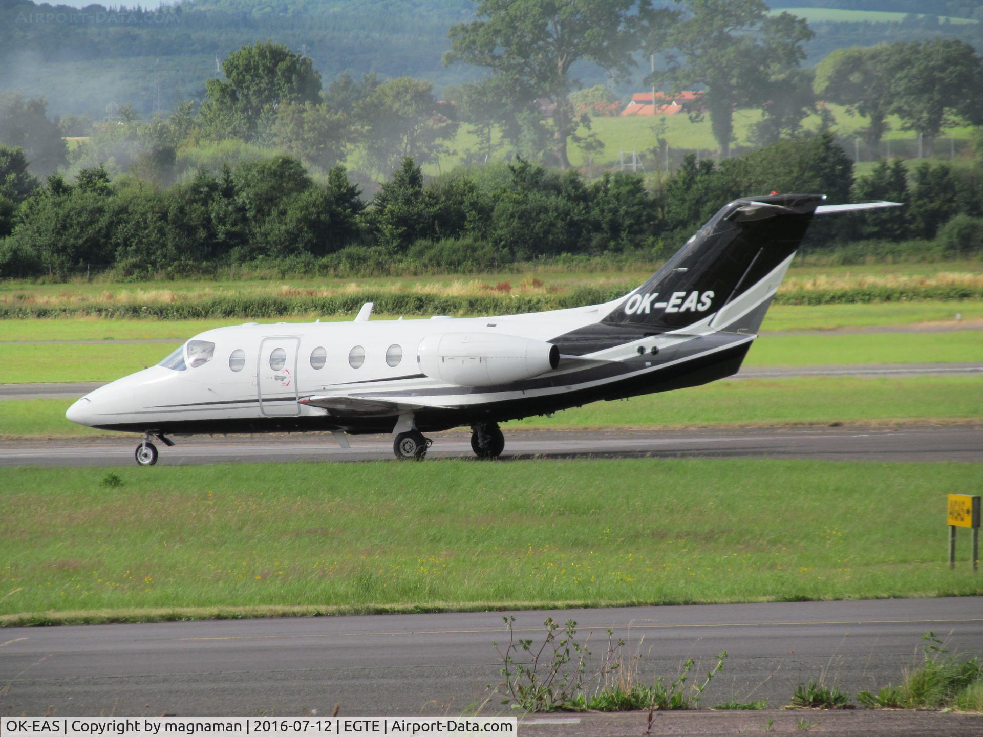OK-EAS, 1998 Beech 400XT Nextant Beechjet C/N RK-180, about to leave - from across apron