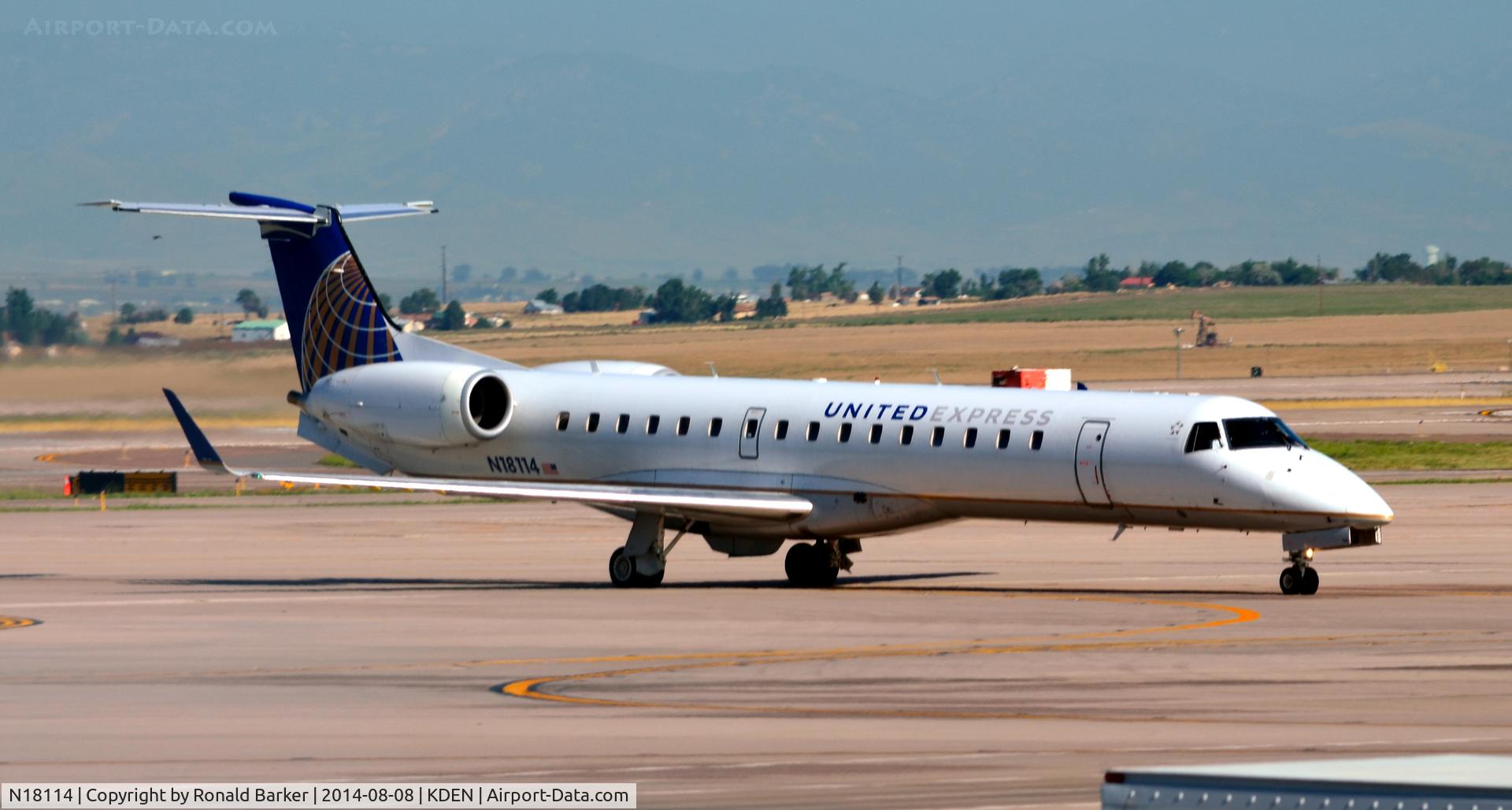 N18114, 2002 Embraer ERJ-145XR (EMB-145XR) C/N 145664, Taxi Denver