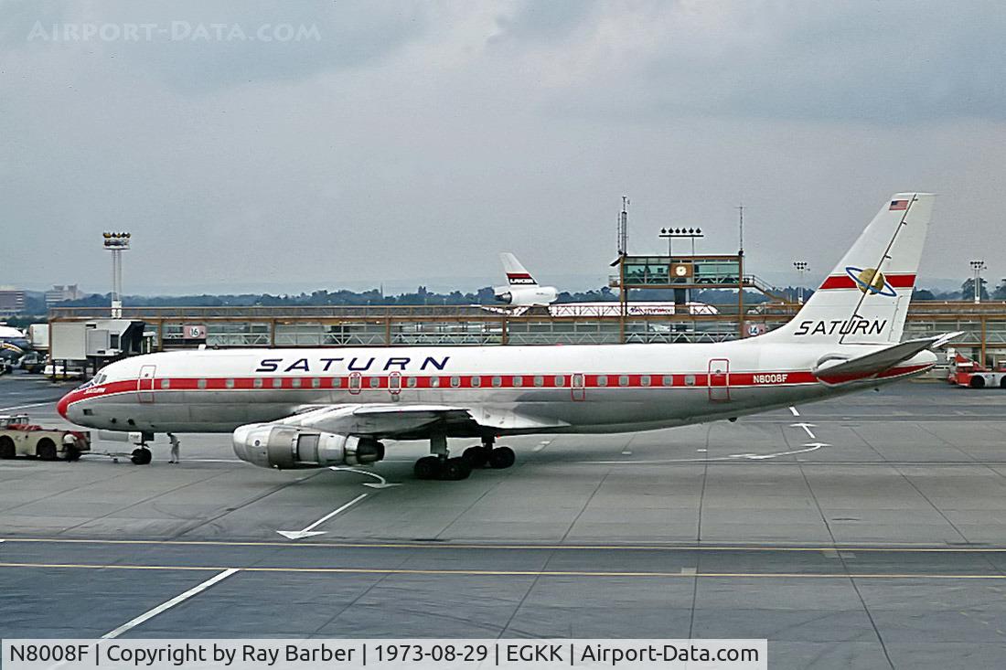 N8008F, 1963 Douglas DC-8F-54 C/N 45669, Douglas DC-8-54 [45669] (Saturn Airways) Gatwick~G 29/08/1973. From a slide.