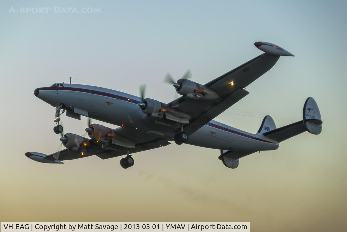 VH-EAG, 1955 Lockheed L-1049F Super Constellation C/N 4176, Southern Preservation departing in golden twilight for her display at the 2013 Australian Intl Airshow in Avalon VIC