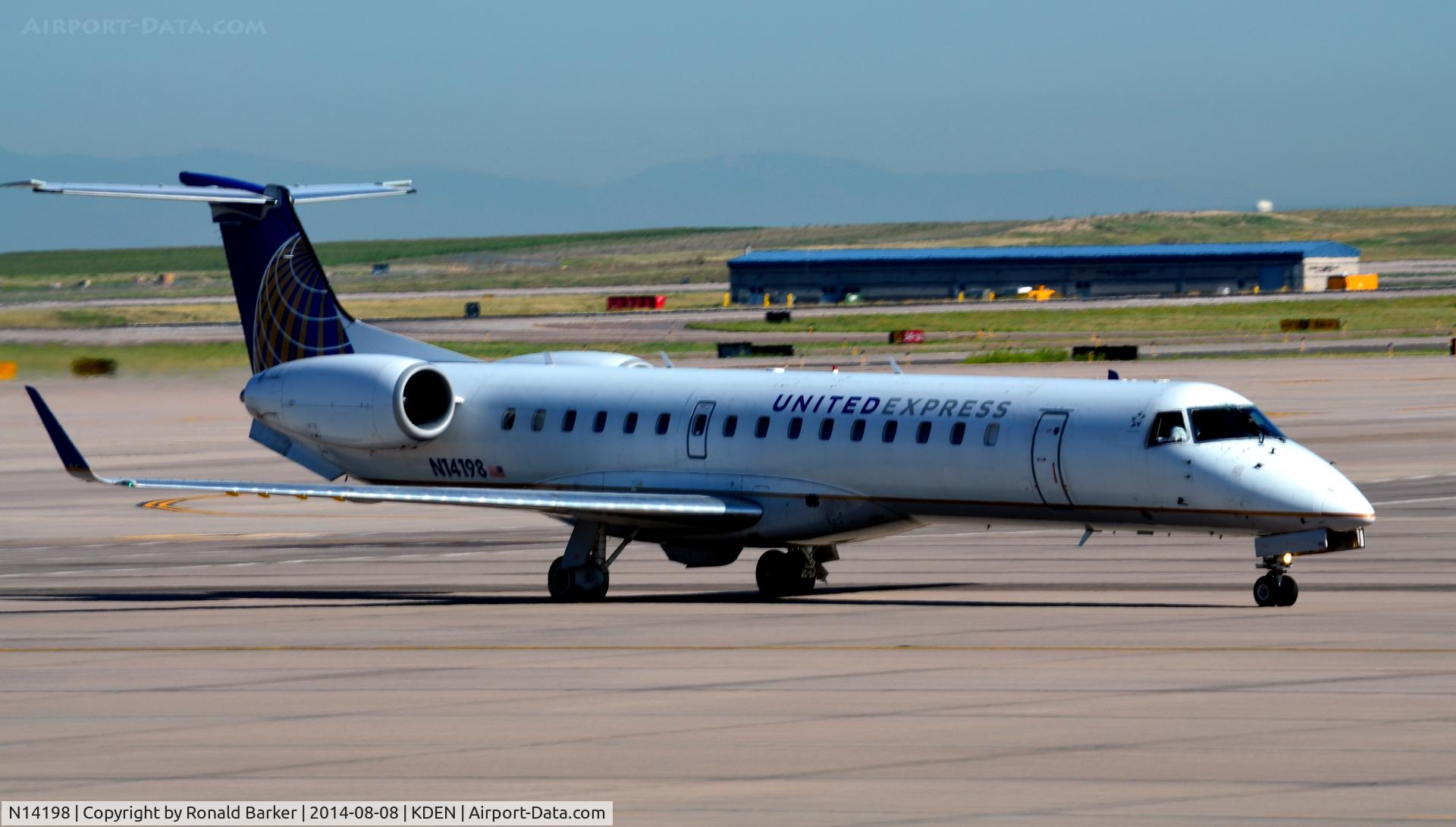 N14198, 2006 Embraer ERJ-145XR (EMB-145XR) C/N 14500951, Taxi Denver