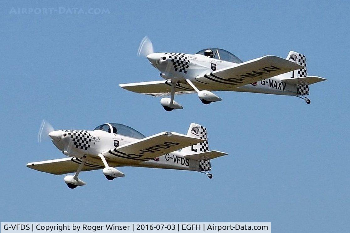 G-VFDS, 2012 Vans RV-8 C/N PFA 303-14637, Raven 2 of Team Raven in formation with Vans RV-4 aircraft G-MAXV (Raven 1).