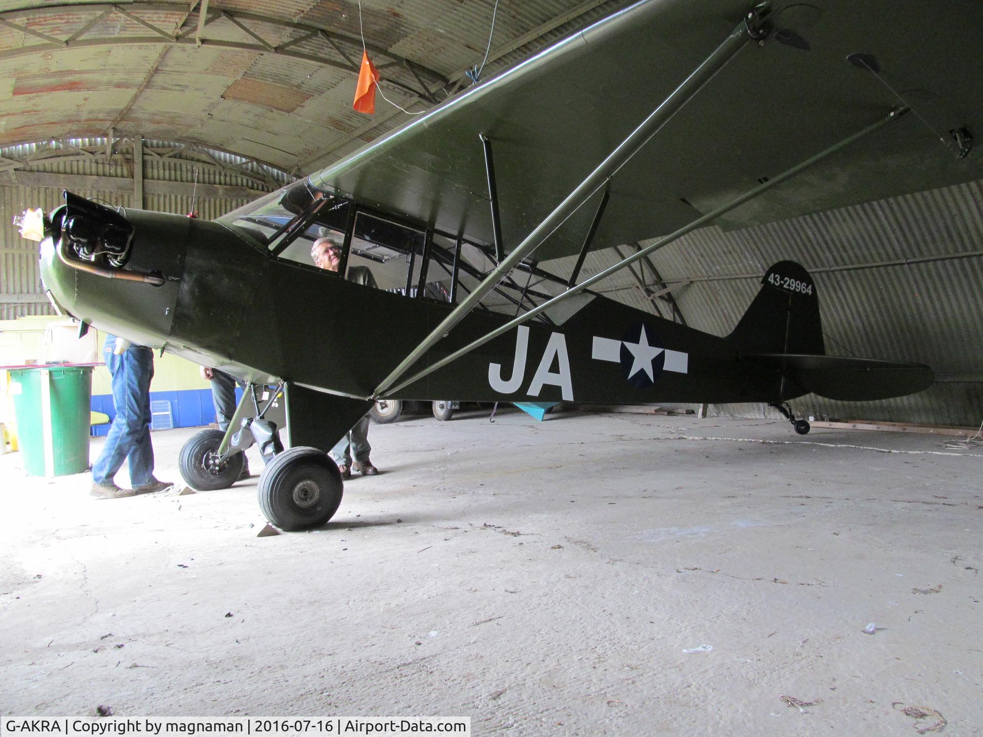 G-AKRA, 1944 Piper L-4H Grasshopper (J3C-65D) C/N 11255, Lovely restored (ex Italian) machine - not flown since 1954 until this year!!! Thanks to host Adrian. Taken at home base of Mitchells Farm strip near Cambridge.