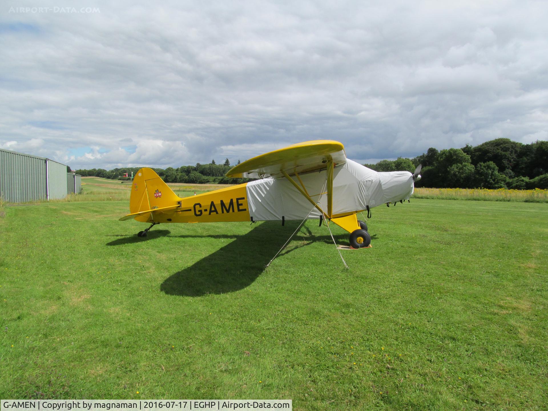 G-AMEN, 1952 Piper L-18C Super Cub C/N 18-1998, in sun at popham