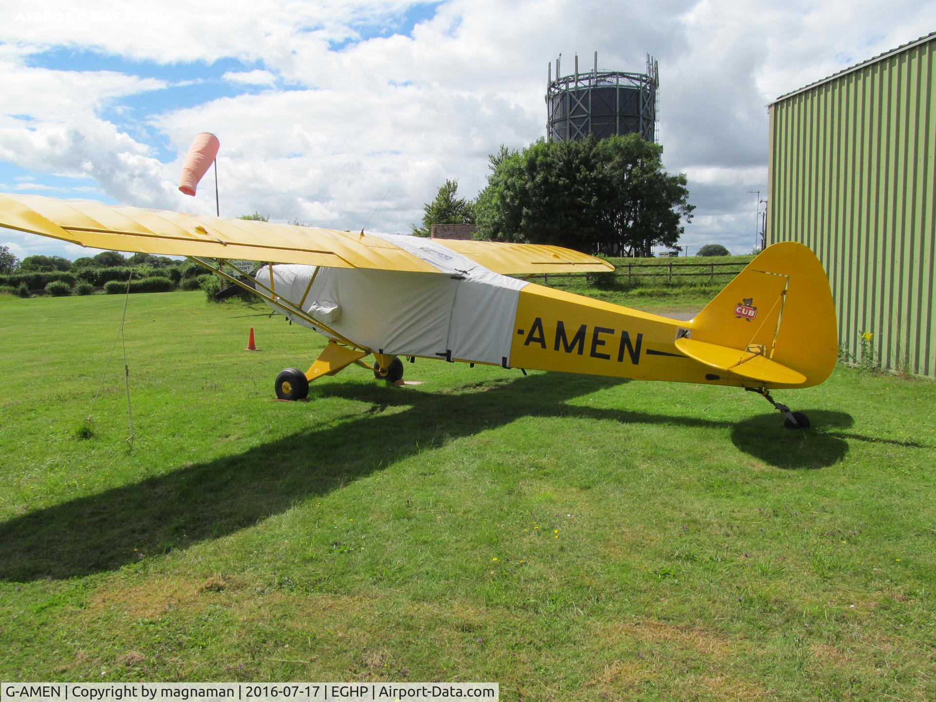G-AMEN, 1952 Piper L-18C Super Cub C/N 18-1998, on grass at popham