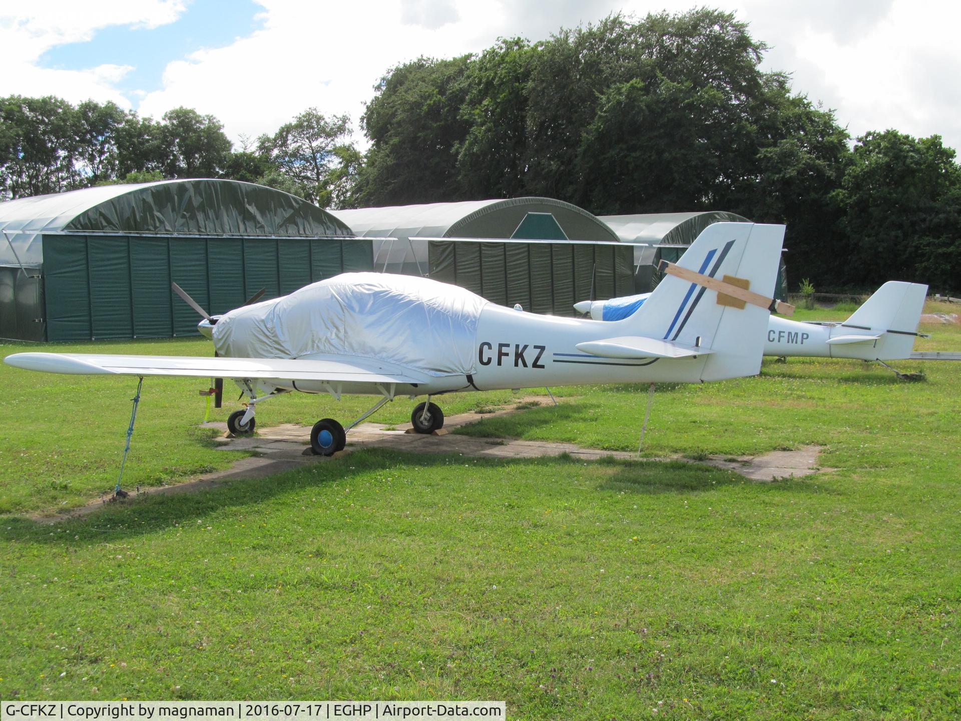G-CFKZ, 2008 Europa XS Tri-Gear C/N PFA 247-14178, under cover at popham