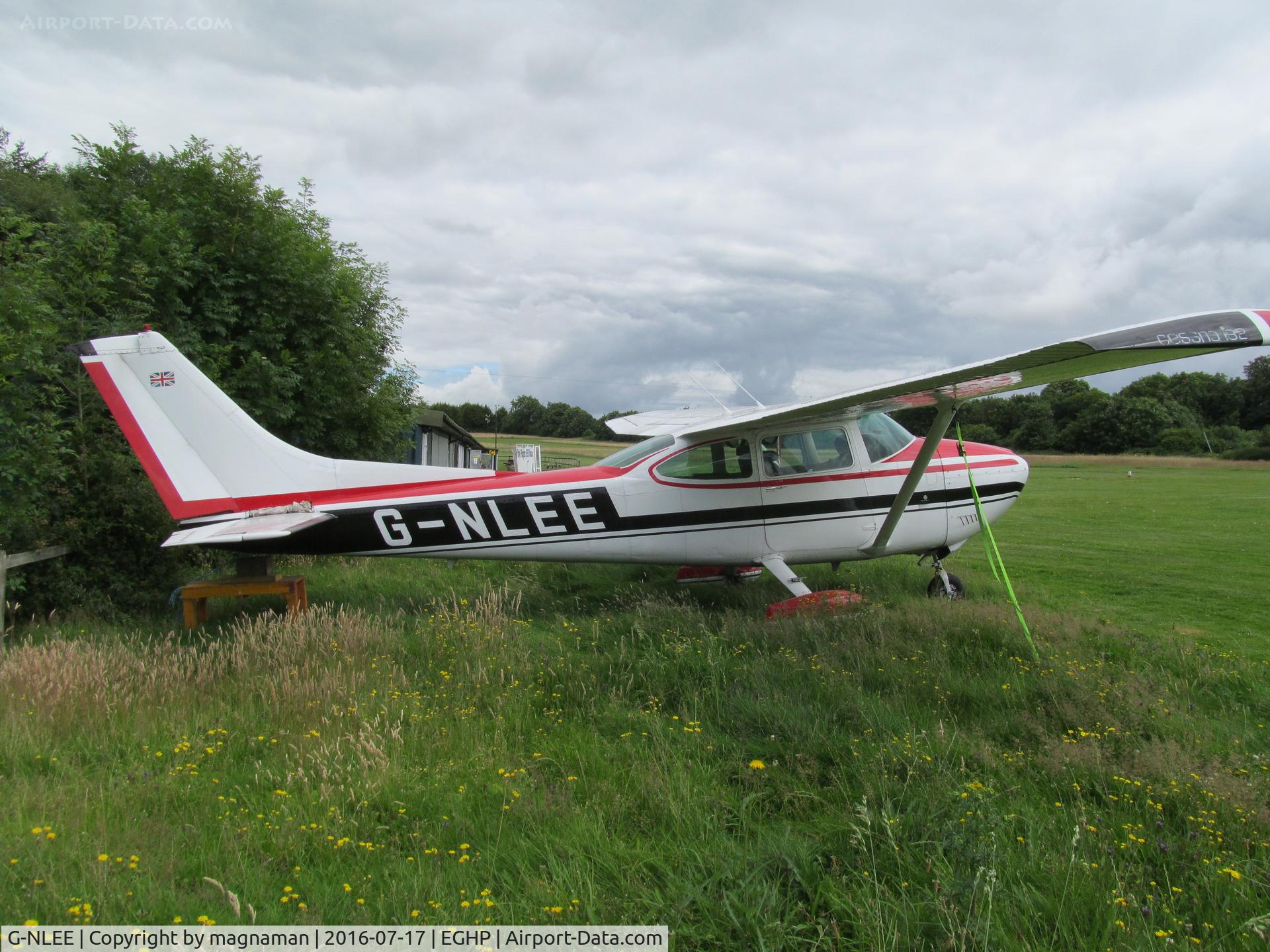 G-NLEE, 1977 Cessna 182Q Skylane C/N 182-65934, in long grass