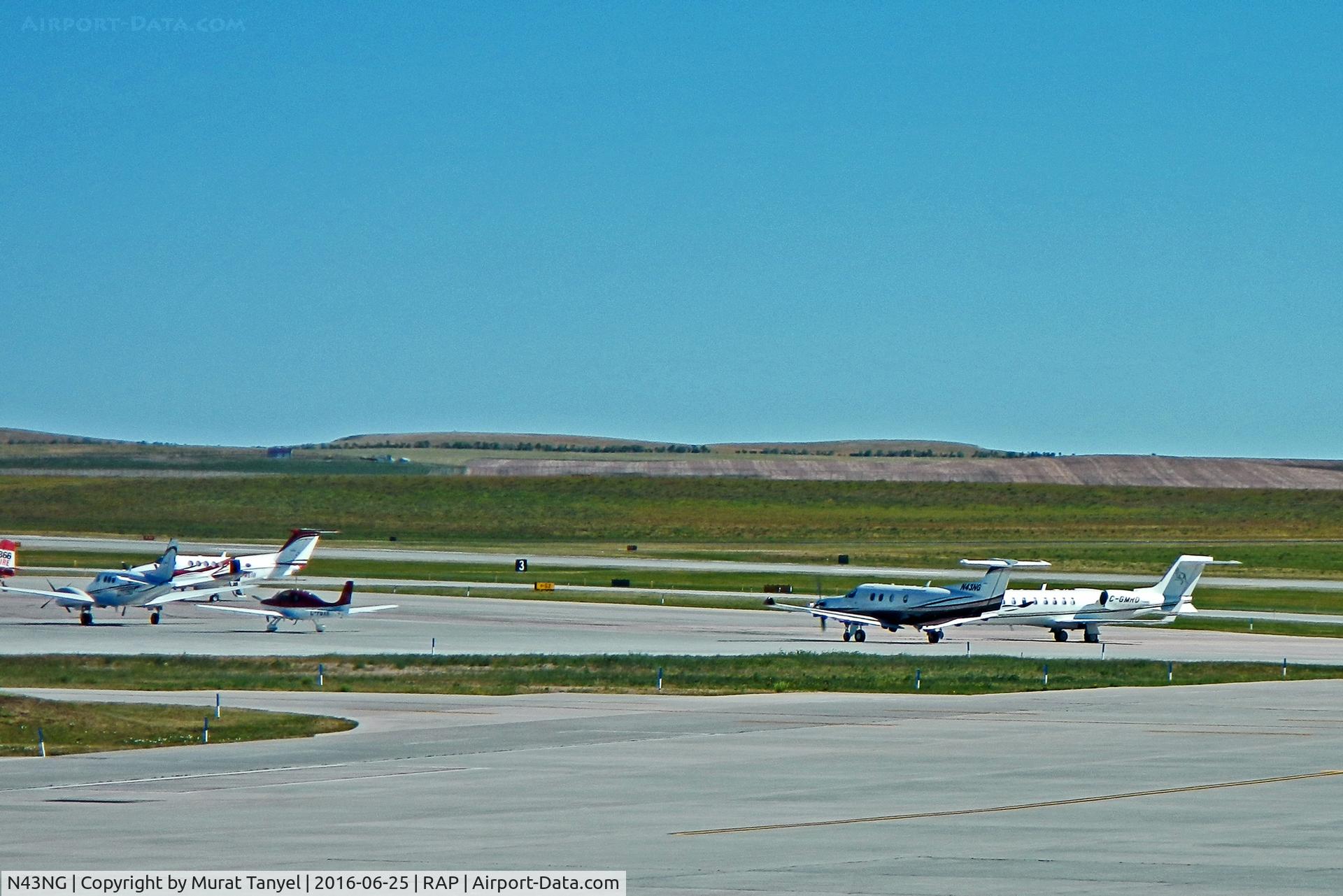 N43NG, 2015 Pilatus PC-12/47E C/N 1543, Taxiing at Rapid City Airport (second from right).