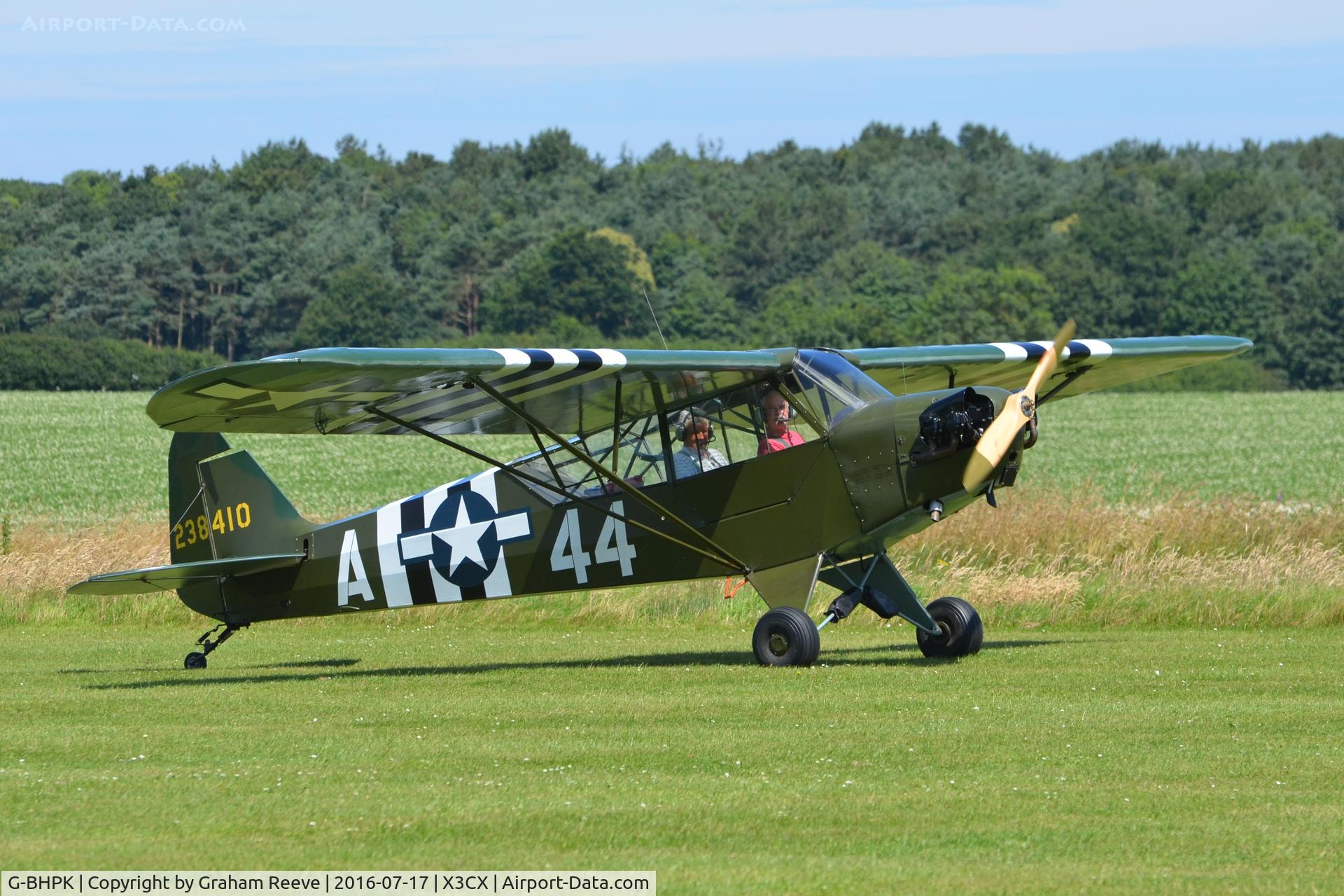 G-BHPK, 1943 Piper L-4H Grasshopper (J3C-65D) C/N 12161, Just landed at Northrepps.