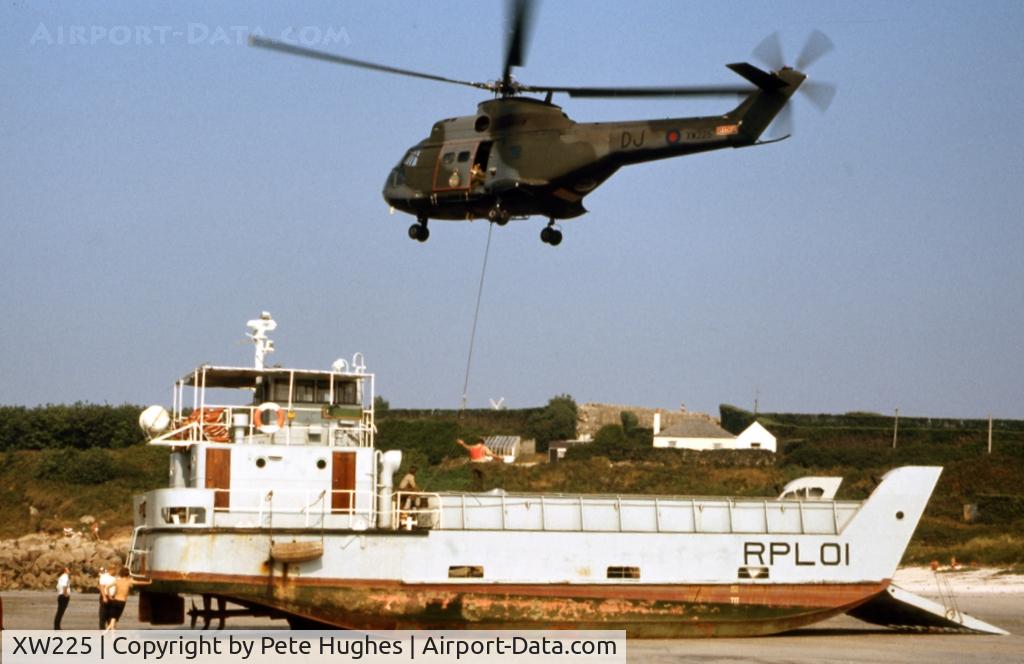 XW225, 1972 Westland Puma HC.1 C/N 1170, For my 1,000th picture here I wanted to find something a little special.  This was taken in (September?) 1972 at Porth Mellon beach, St Mary's, Isles of Scilly.  The activity is delivery of a hut for the cadets which was to be installed on the Garrison.