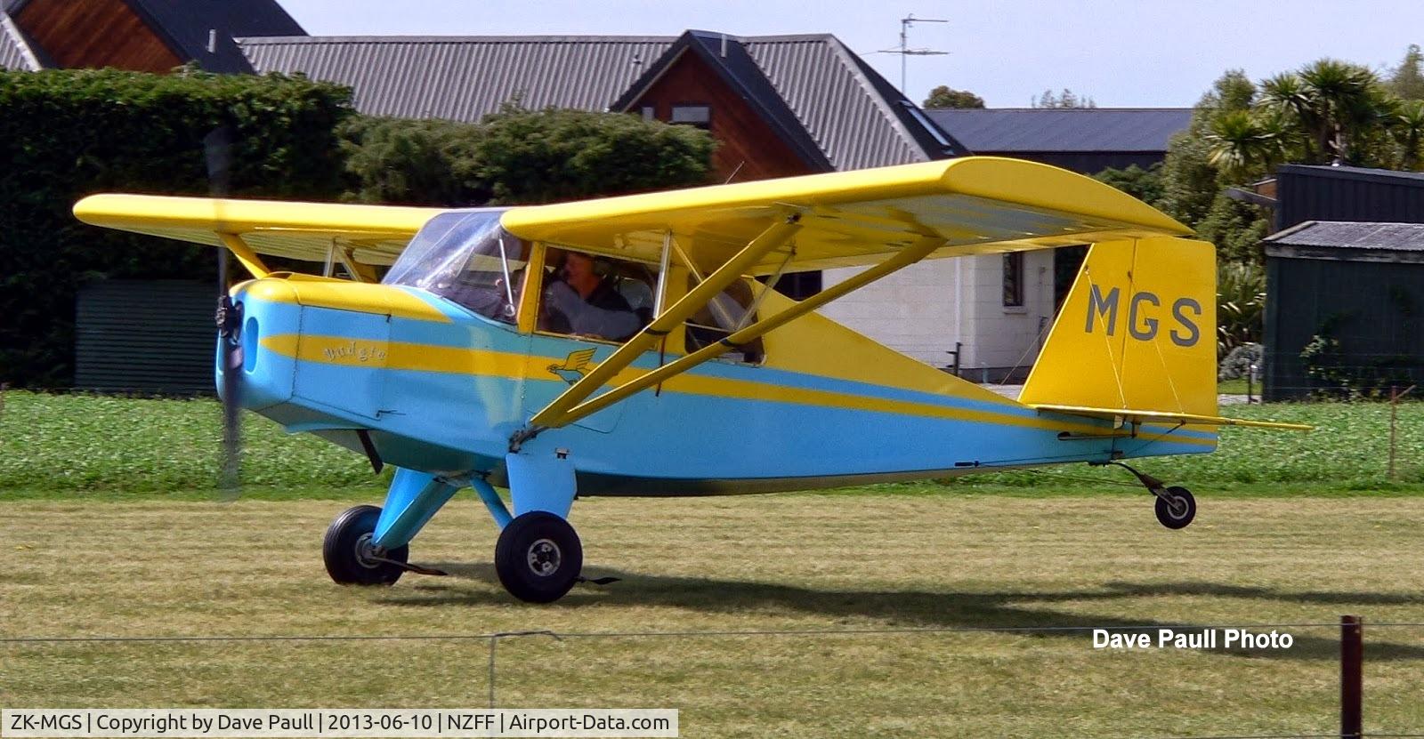 ZK-MGS, Roger Mann Ragabond C/N 001, The Ragabond is 18 feet (5.49 metres) in length and has a wingspan of 28 feet (8.53 metres).  Its wing area is 123 square feet.  Empty weight is around 420 pounds (191 Kg) and MAUW is 1,000 pounds (454 Kg).  Engines can range from the 50 HP 2 stroke Rotax