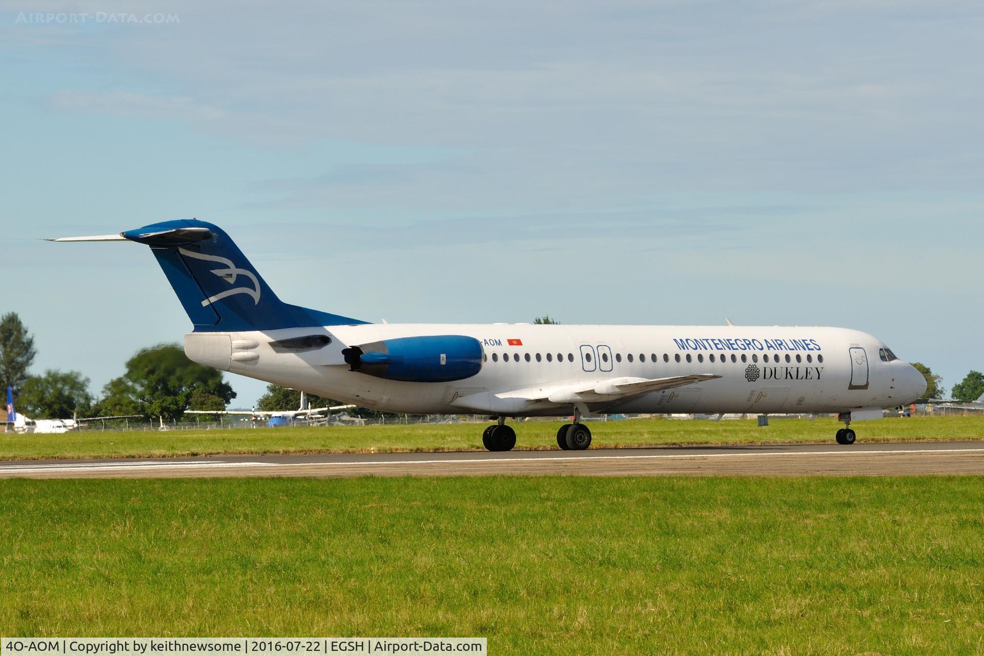 4O-AOM, 1990 Fokker 100 (F-28-0100) C/N 11321, Leaving Norwich.