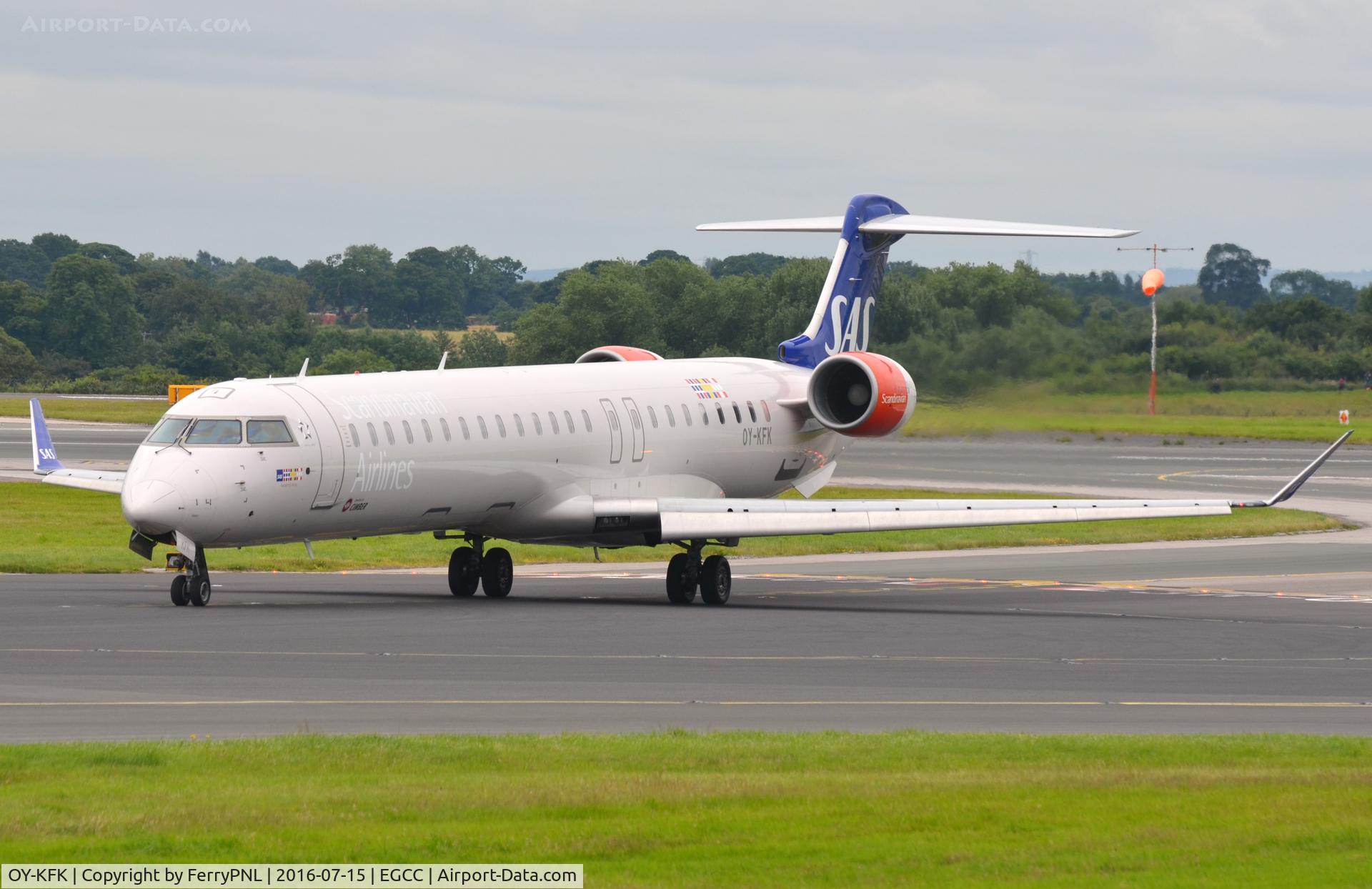 OY-KFK, 2009 Bombardier CRJ-900 (CL-600-2D24) C/N 15244, SAS CL900 departing the runway.