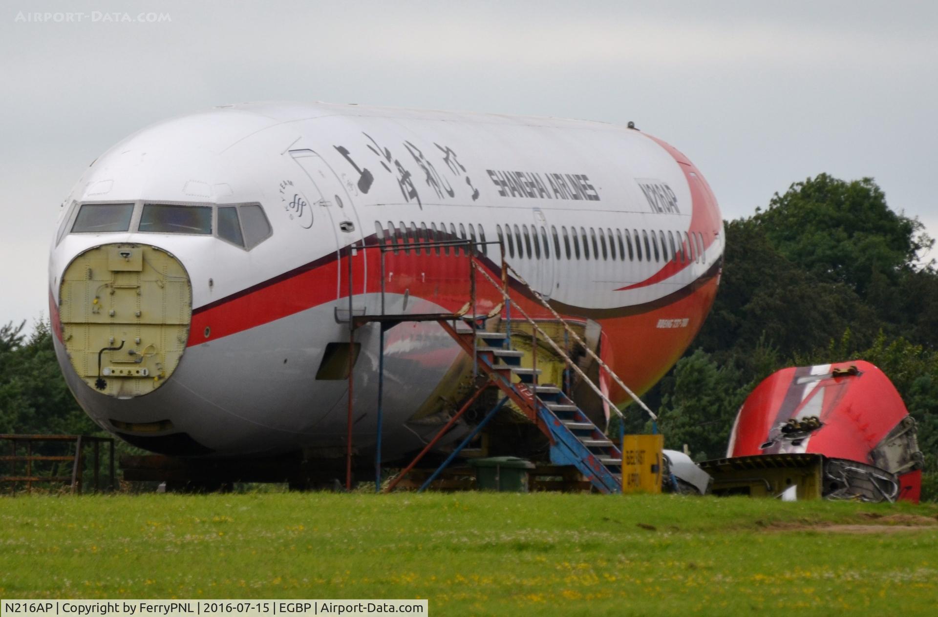 N216AP, 1998 Boeing 737-7Q8 C/N 28216, Left-overs of former Shanghai B737.