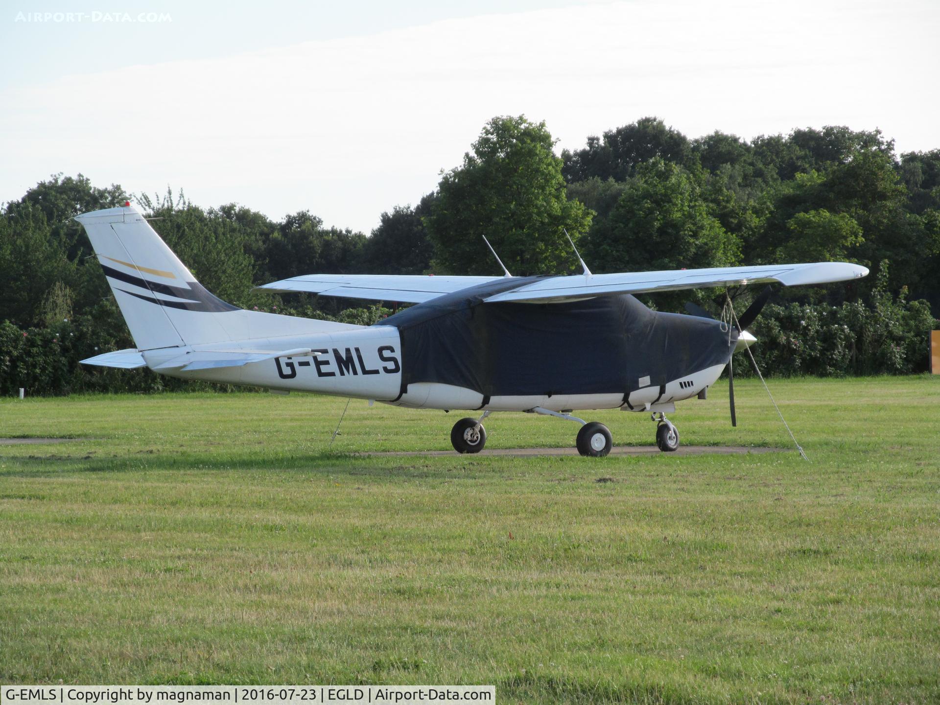 G-EMLS, 1974 Cessna T210L Turbo Centurion C/N 210-60094, on grass at denham