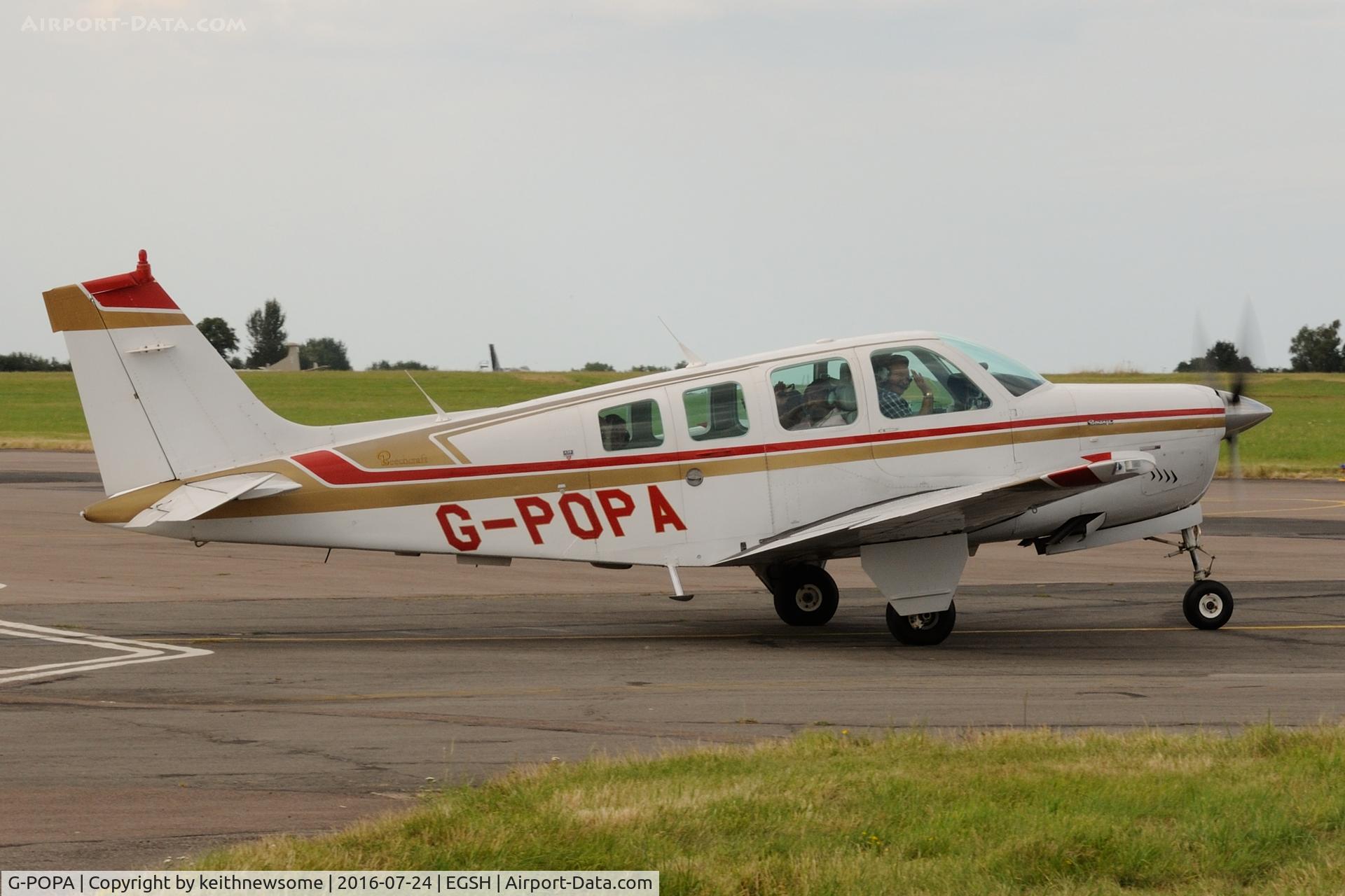G-POPA, 1984 Beech A36 Bonanza 36 C/N E-2177, Leaving Norwich with a wave.