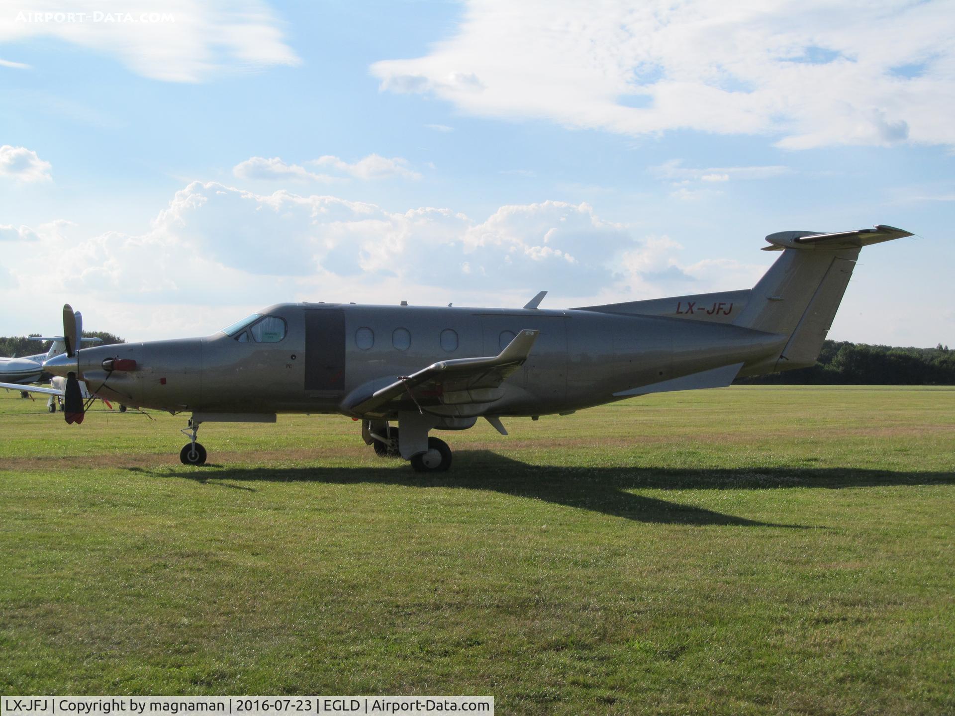 LX-JFJ, 2005 Pilatus PC-12/45 C/N 678, on grass at denham