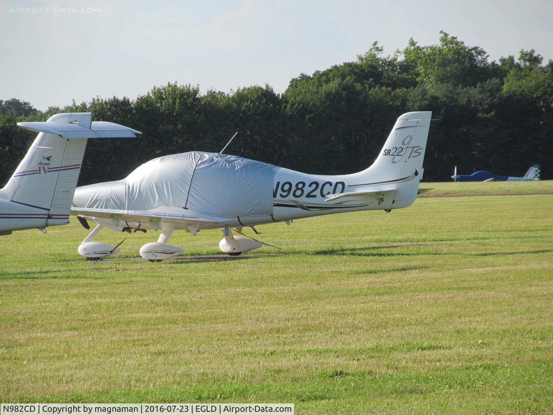 N982CD, 2006 Cirrus SR22 GTS C/N 1853, on grass at denham