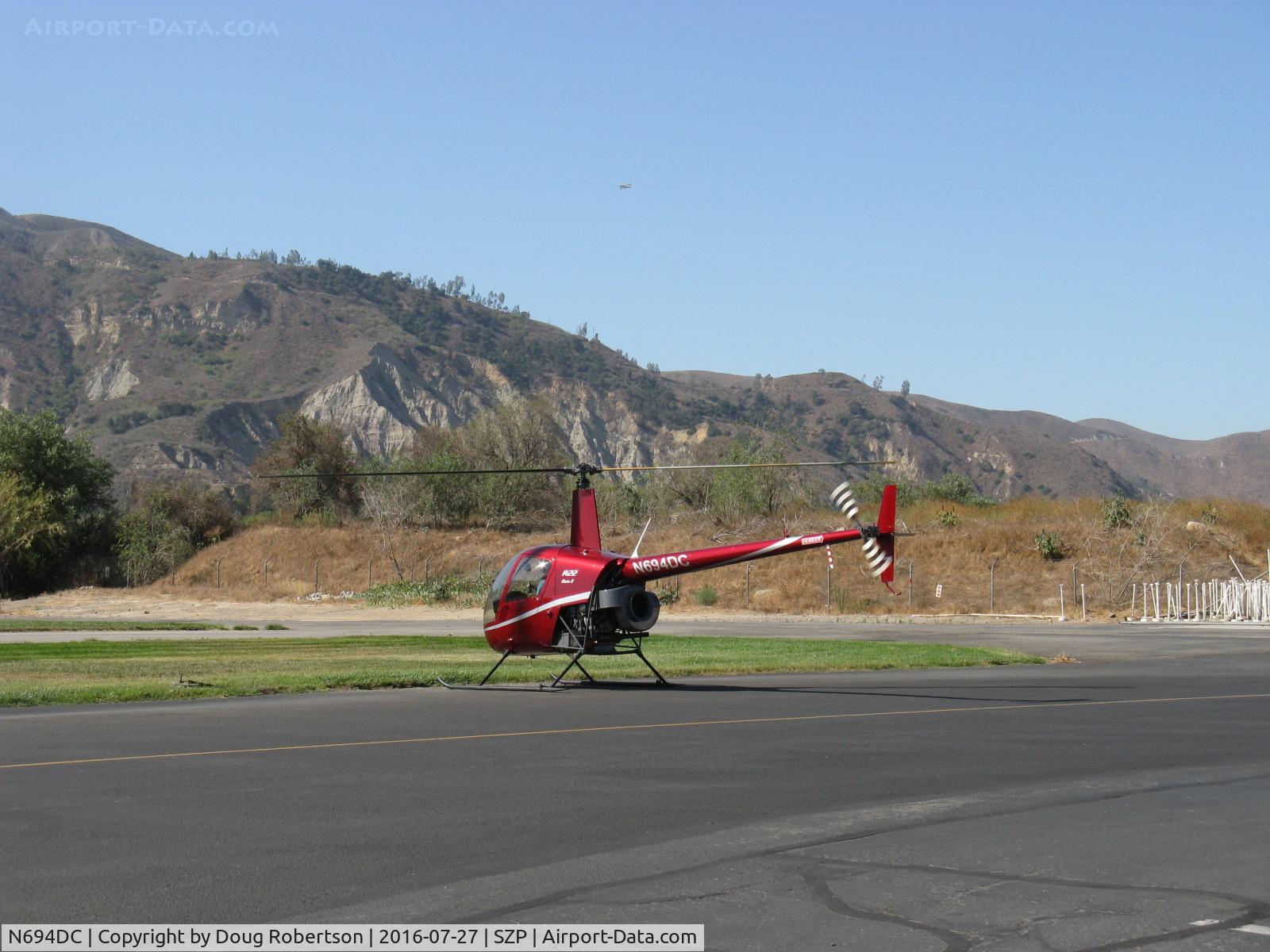 N694DC, 2004 Robinson R22 Beta C/N 3573, 2004 Robinson R22 BETA II, Lycoming O-360 derated to 131 Hp, engine warmup near hangar