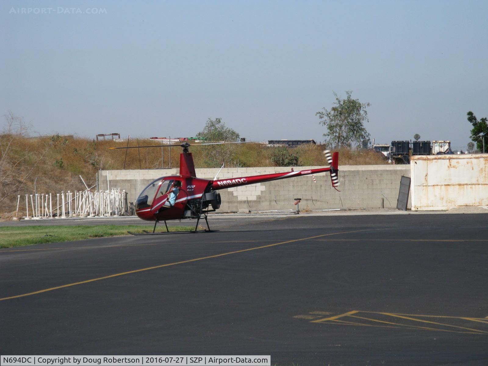 N694DC, 2004 Robinson R22 Beta C/N 3573, 2004 Robinson R22 BETA II, Lycoming O-360 derated to 131 Hp, engine warmup near its hangar