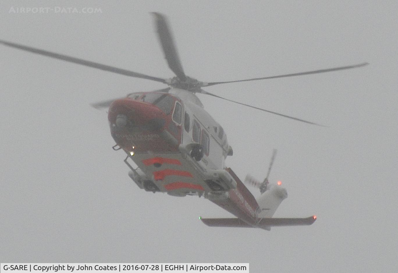 G-SARE, 2015 AgustaWestland AW-139 C/N 31610, Just visible during a low pass in very low cloud