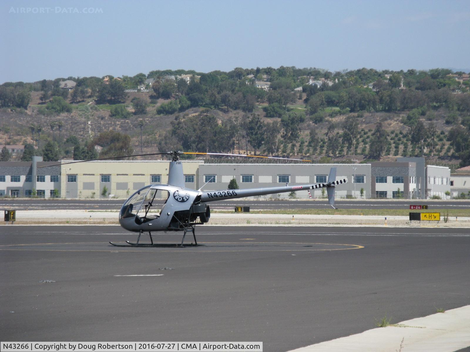 N43266, 1990 Robinson R22 Beta C/N 1268, 1990 Robinson R22 BETA, Lycoming O-320-B2C, at Orbic's ramp near the Control Tower