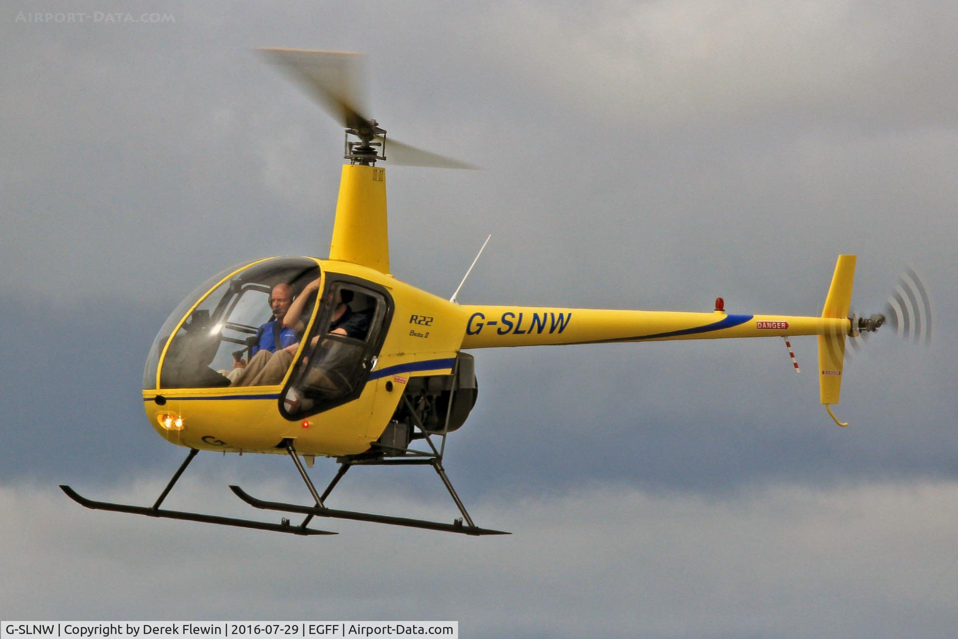 G-SLNW, 2003 Robinson R22 Beta II C/N 3524, Beta II, Commission Air Ltd, previously G-LNIC, in for fuel.