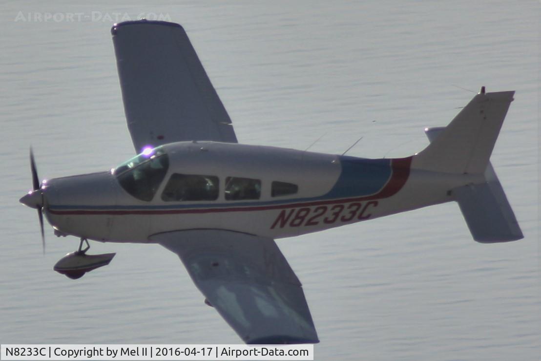 N8233C, 1975 Piper PA-28-151 Cherokee Warrior C/N 28-7615083, Passing by the Sleeping Bear Dunes National Park over Lake Michigan
