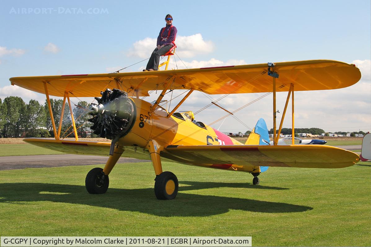 G-CGPY, 1945 Boeing E75N1 C/N 75-5303, Boeing E75N1 on wing walking duties during The Real Aeroplane Company's Summer Madness Fly-In, Breighton Airfield, August 21st 2011.