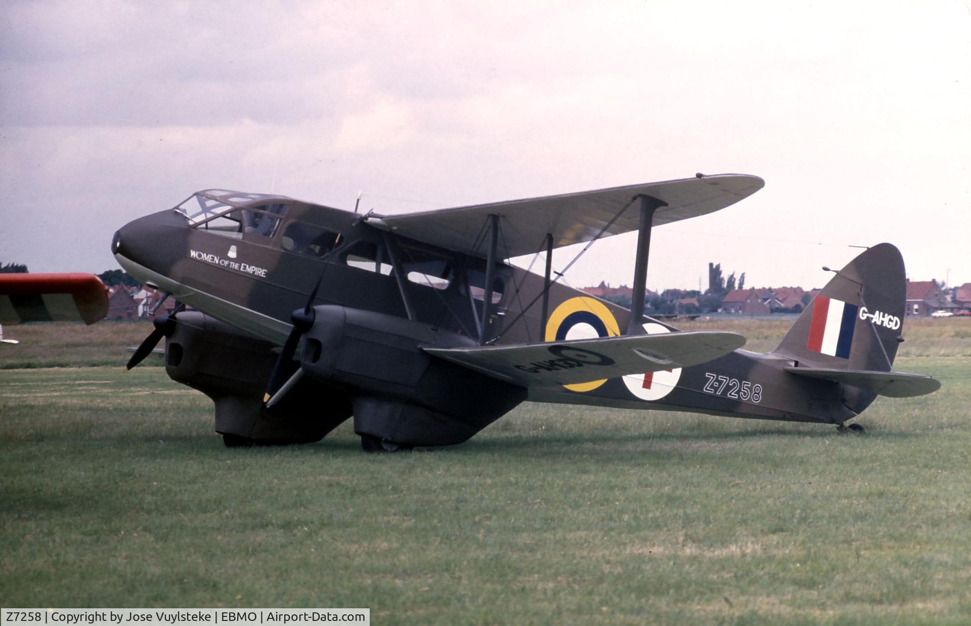 Z7258, De Havilland DH-89A Dragon Rapide C/N 6434, Picture taken at an airshow on the small grassfield airport of Moorsele, Belgium, probably in the 70's. Canon A-1, scanned color slide.