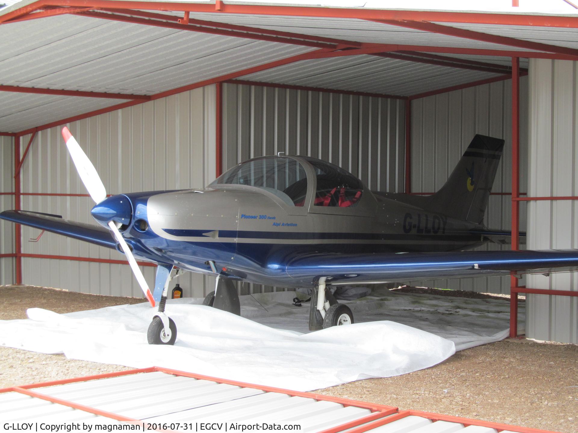 G-LLOY, 2006 Alpi Aviation Pioneer 300 Hawk C/N PFA 330A-14568, hiding in open hangar
