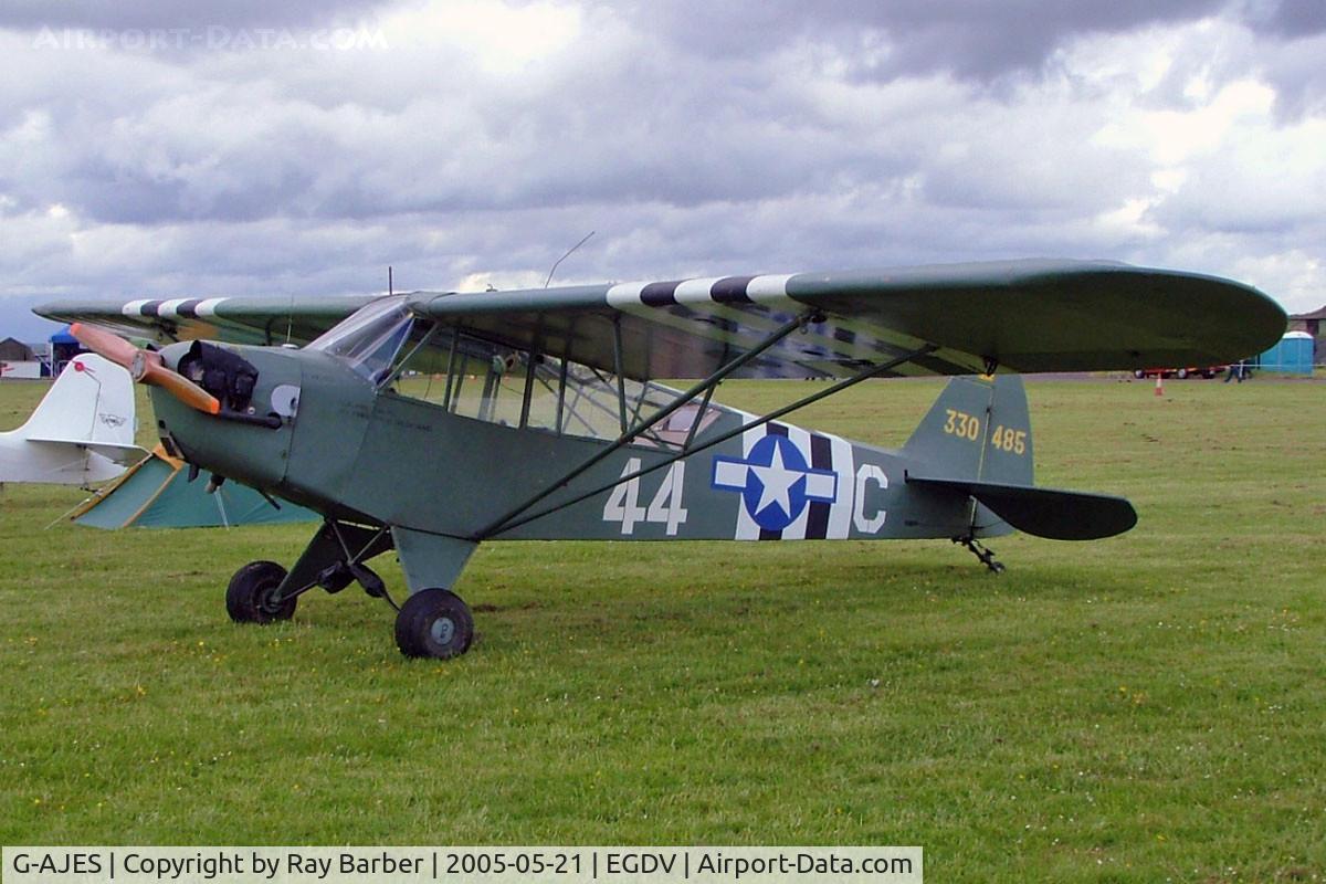 G-AJES, 1943 Piper L-4J Grasshopper (J3C-65D) C/N 11602, Piper J-3C-65 [11776] Hullavington~G 21/05/2005. Wears former military maks,