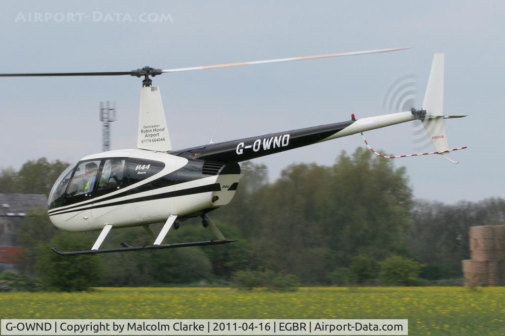 G-OWND, 1999 Robinson R44 Astro C/N 0644, Robinson R44 Astro at Breighton Airfield in April 2011.