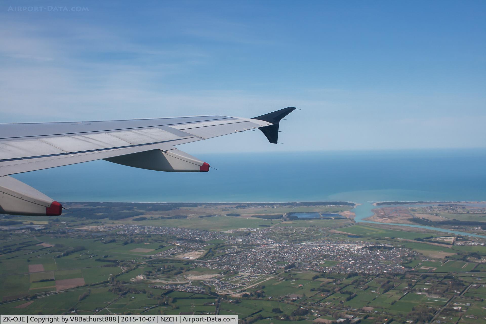 ZK-OJE, 2003 Airbus A320-232 C/N 2148, Onboard ANZ805 as we climb out of christchurch, looking east towards the south Pacific, About to start the turn West