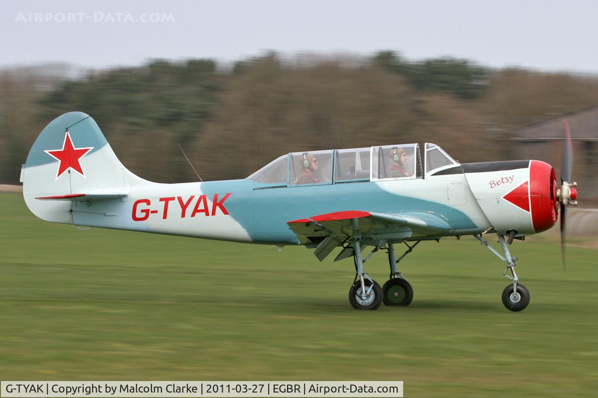 G-TYAK, 1989 Bacau Yak-52 C/N 899907, Bacau Yak-52 at Breighton Airfield in March 2011.